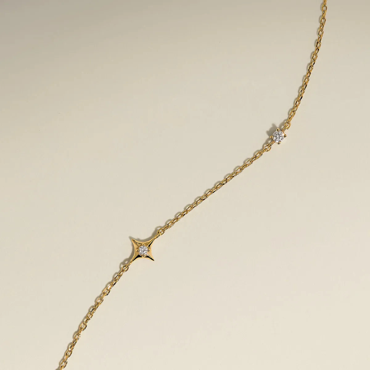 Cosmic Star Charm Bracelet in Gold