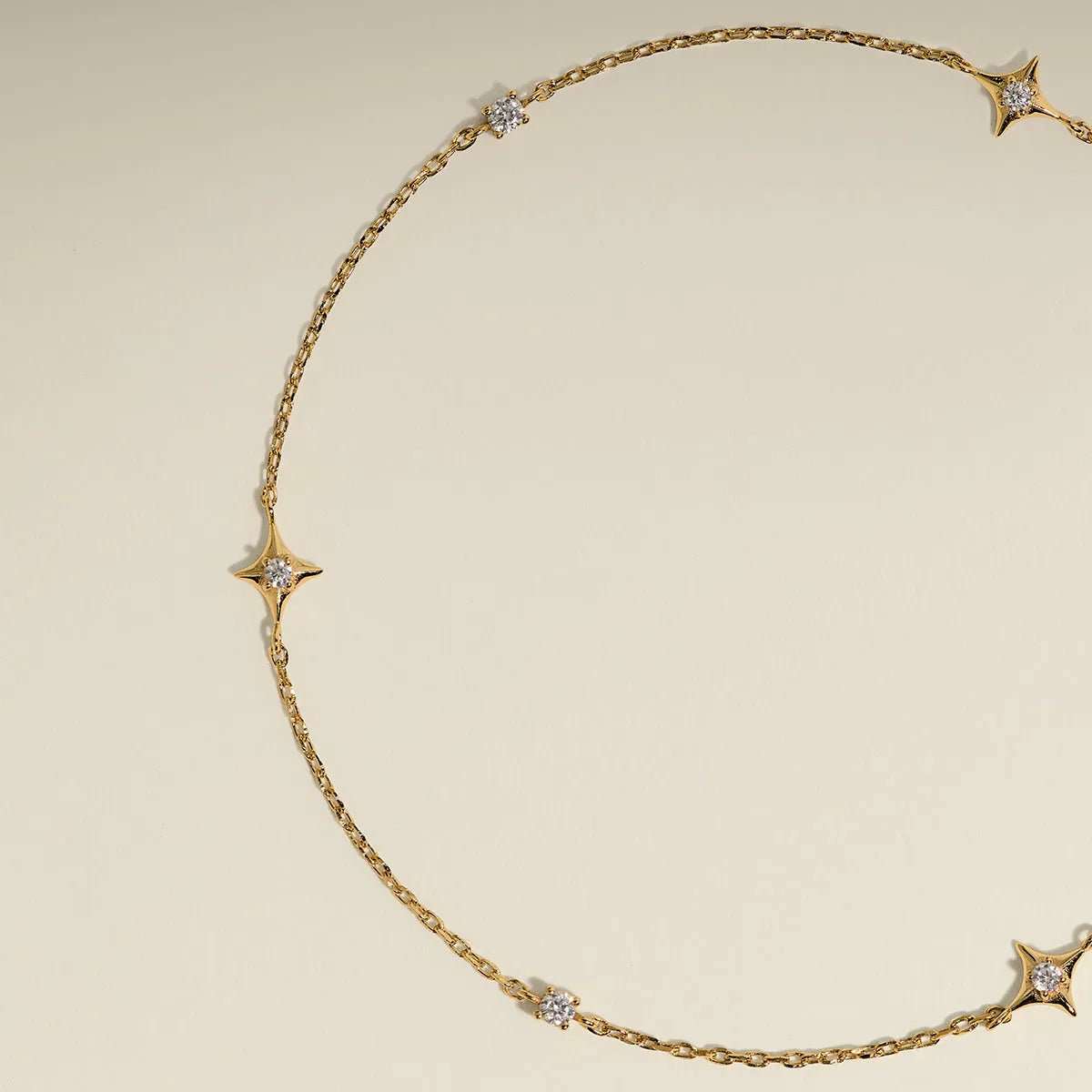 Cosmic Star Charm Bracelet in Gold