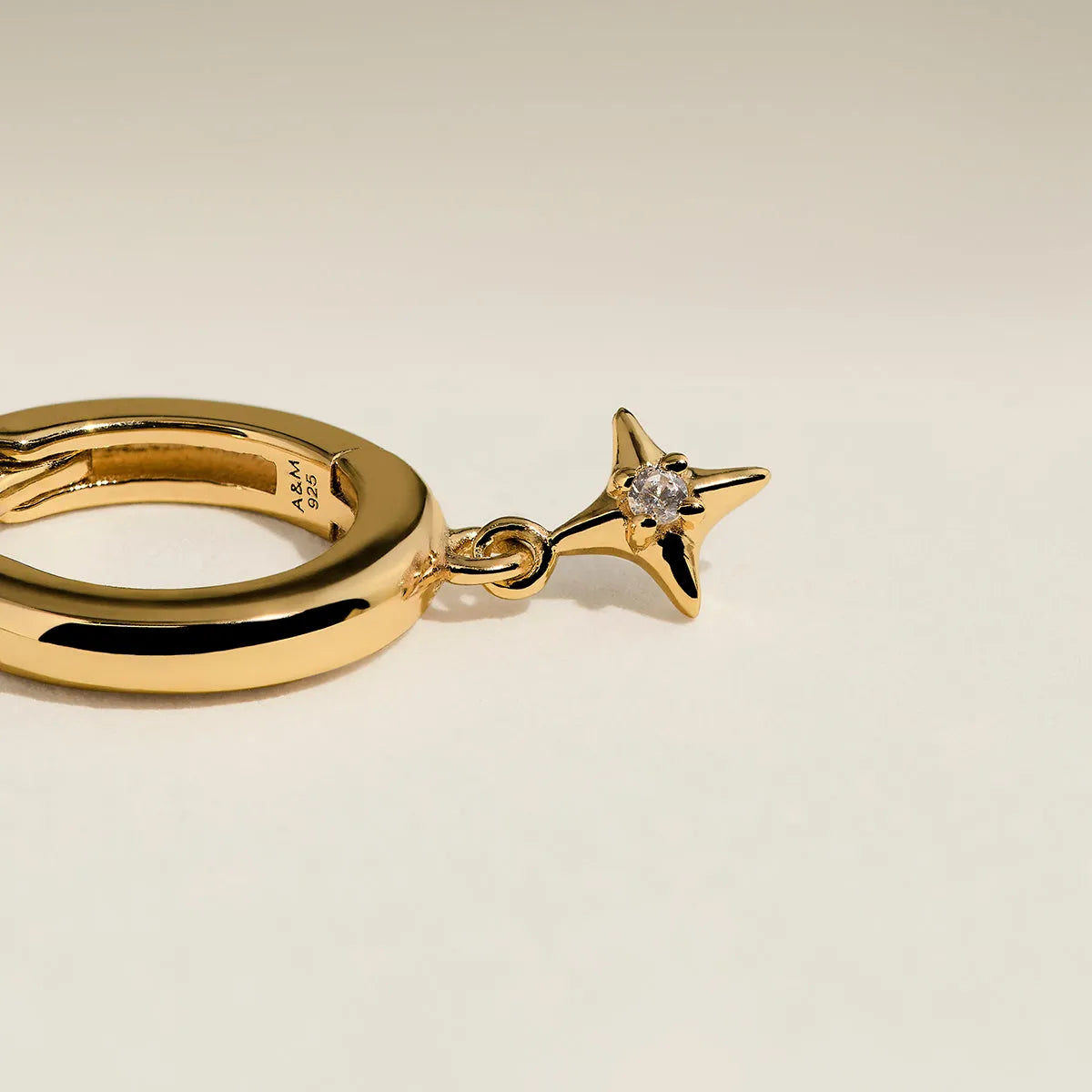 Cosmic Star Charm Huggies in Gold