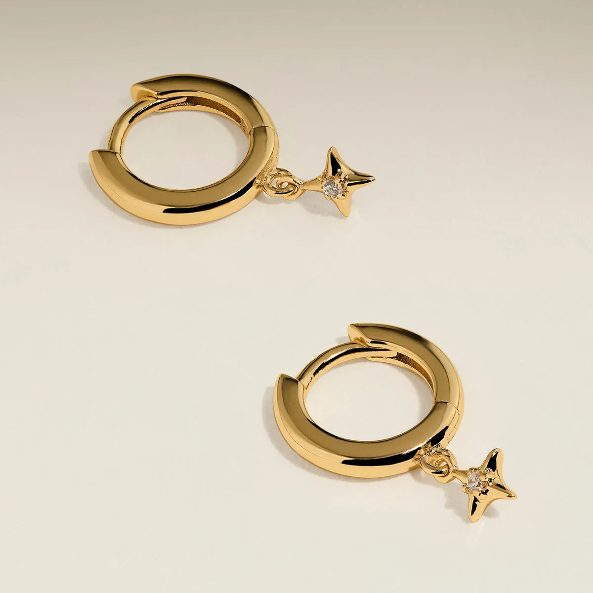 Cosmic Star Charm Huggies in Gold