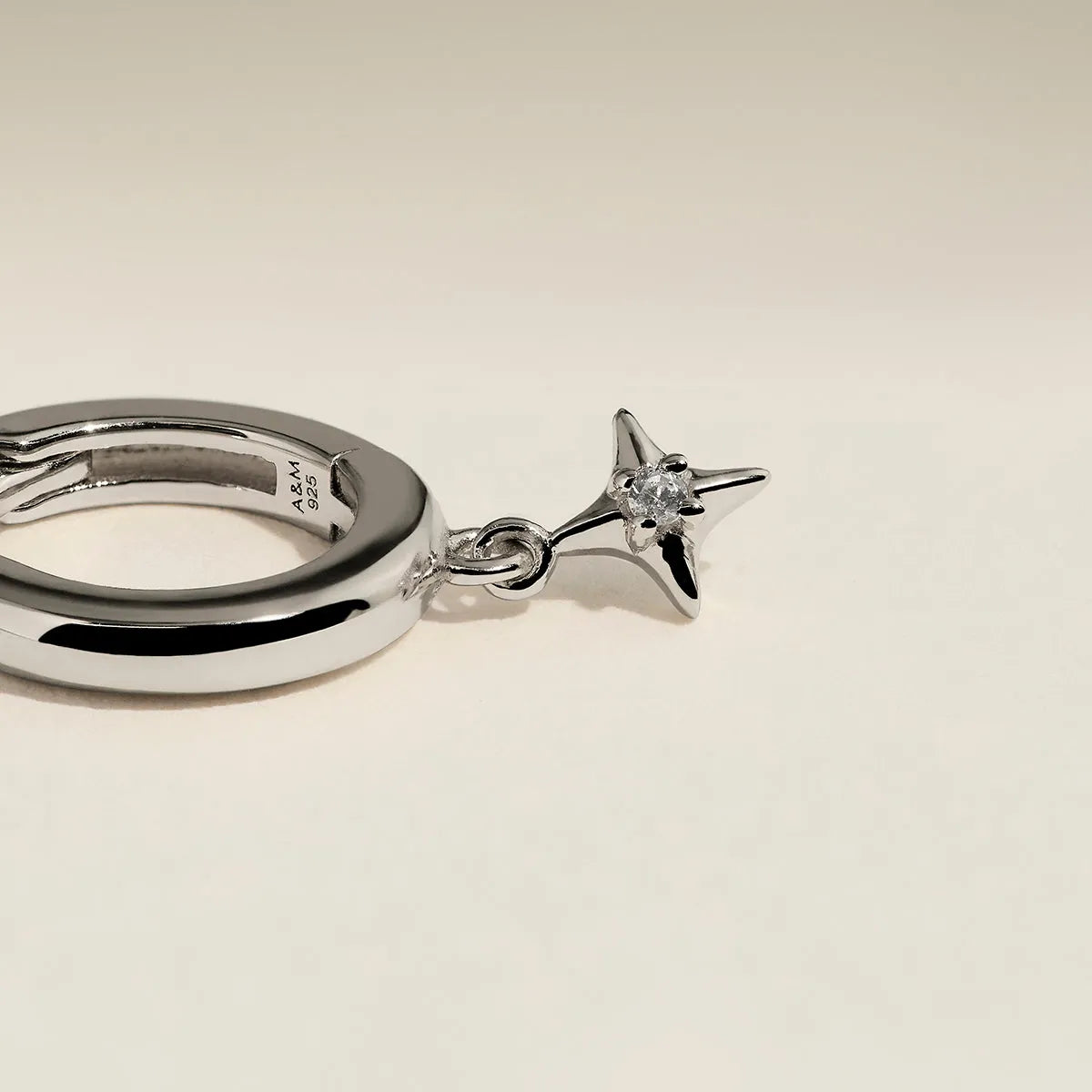 Cosmic Star Charm Huggies in Silver