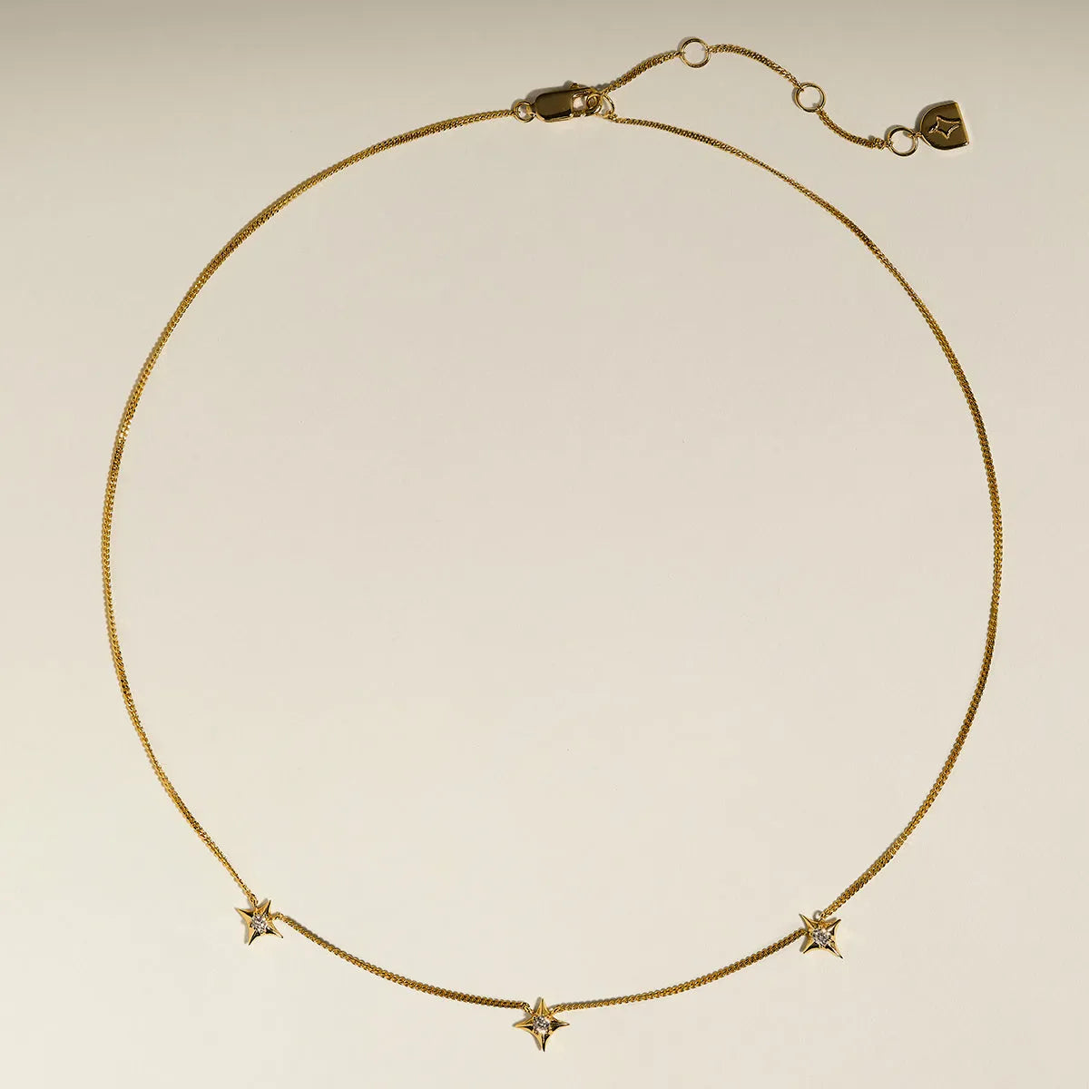 Cosmic Star Charm Necklace in Gold