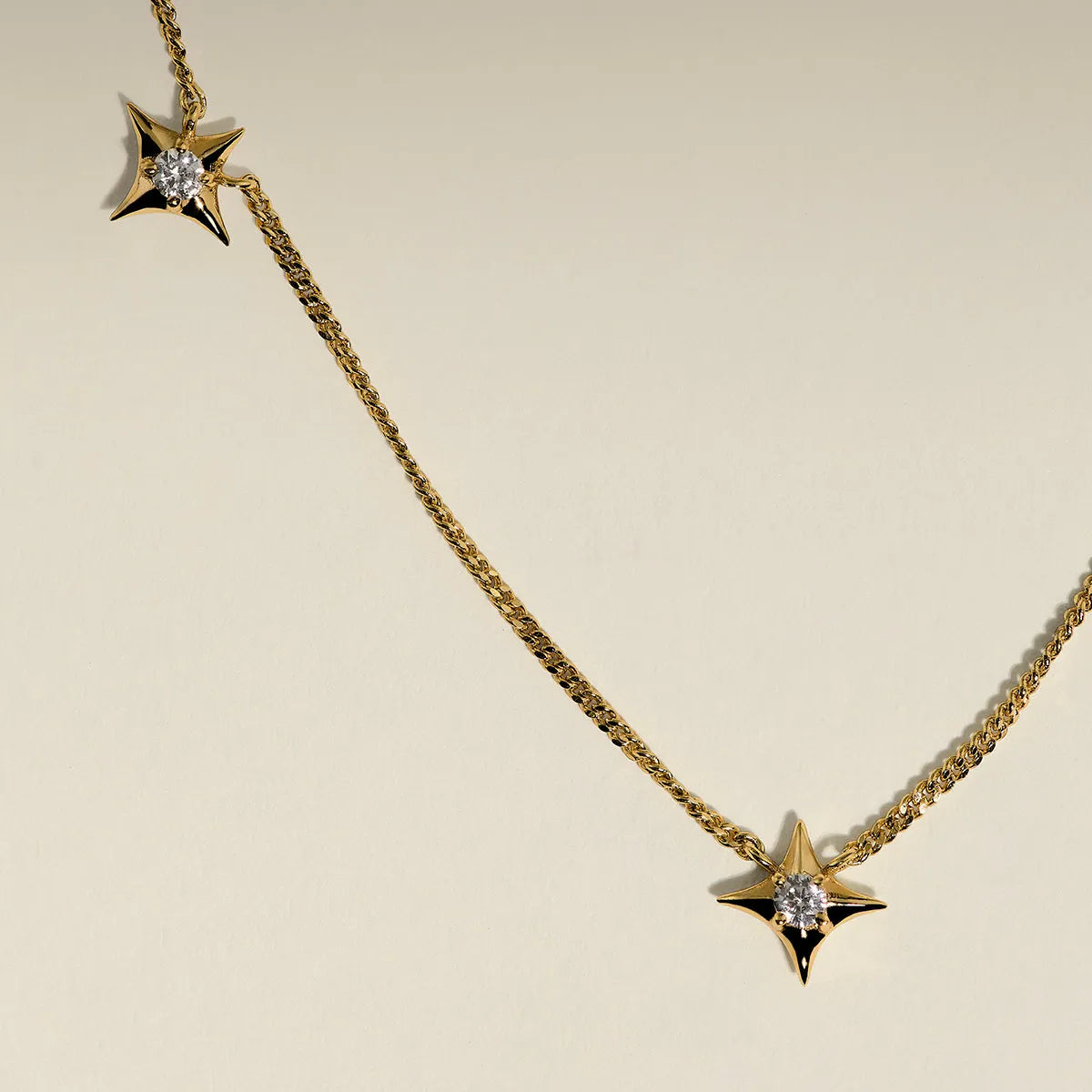 Cosmic Star Charm Necklace in Gold
