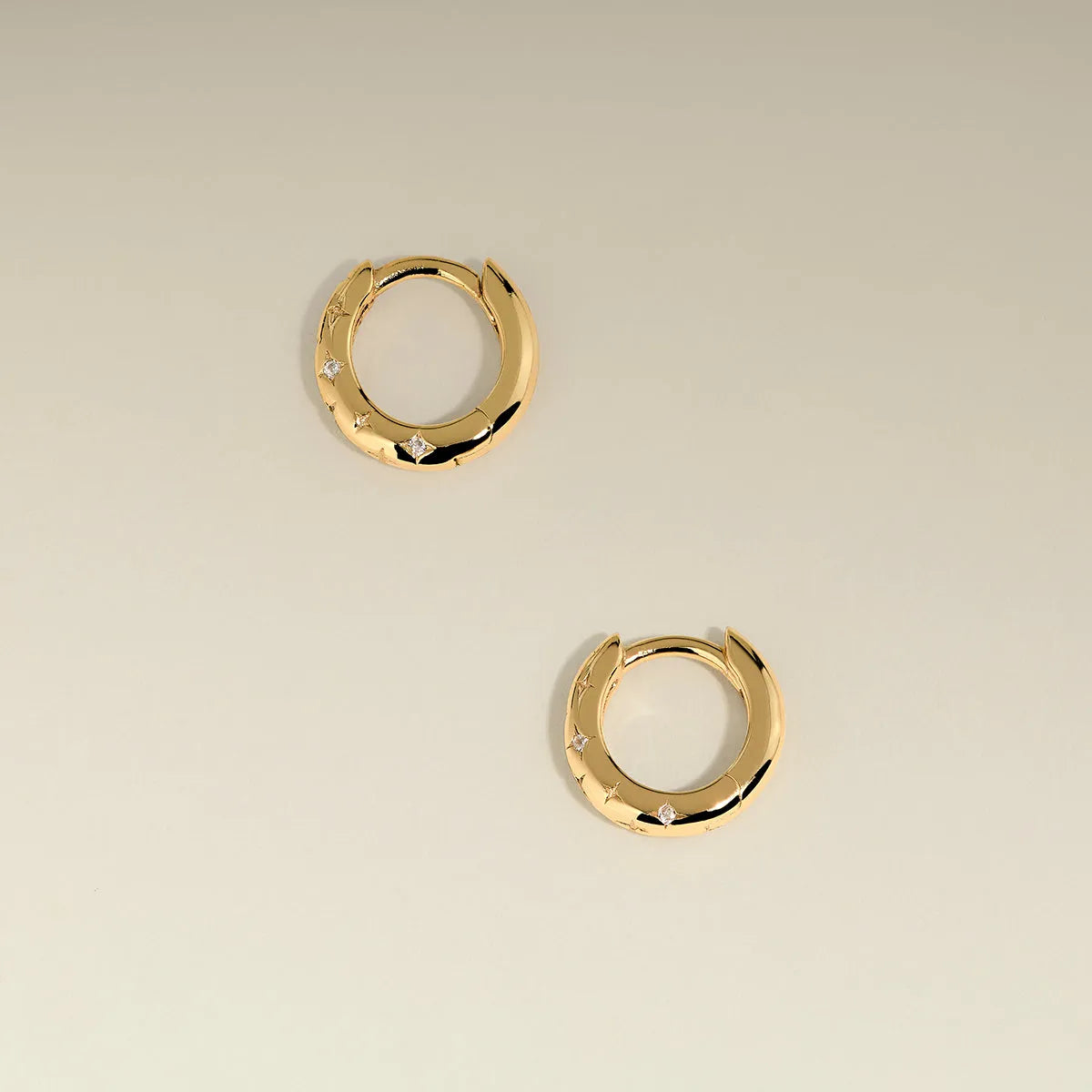 Cosmic Star Huggies in Gold
