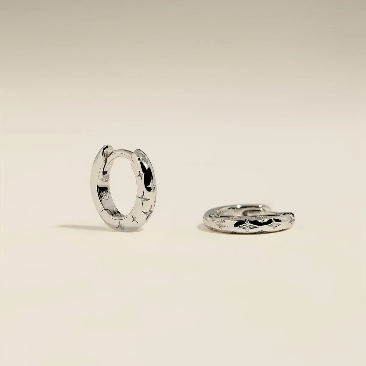 Cosmic Star Huggies in Silver