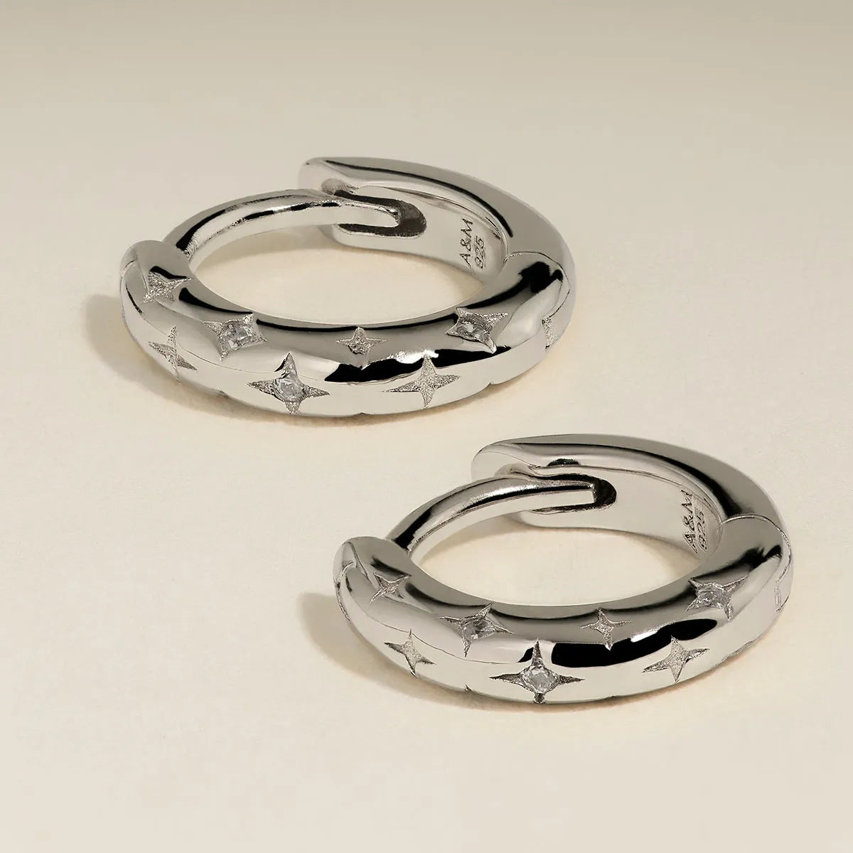 Cosmic Star Huggies in Silver