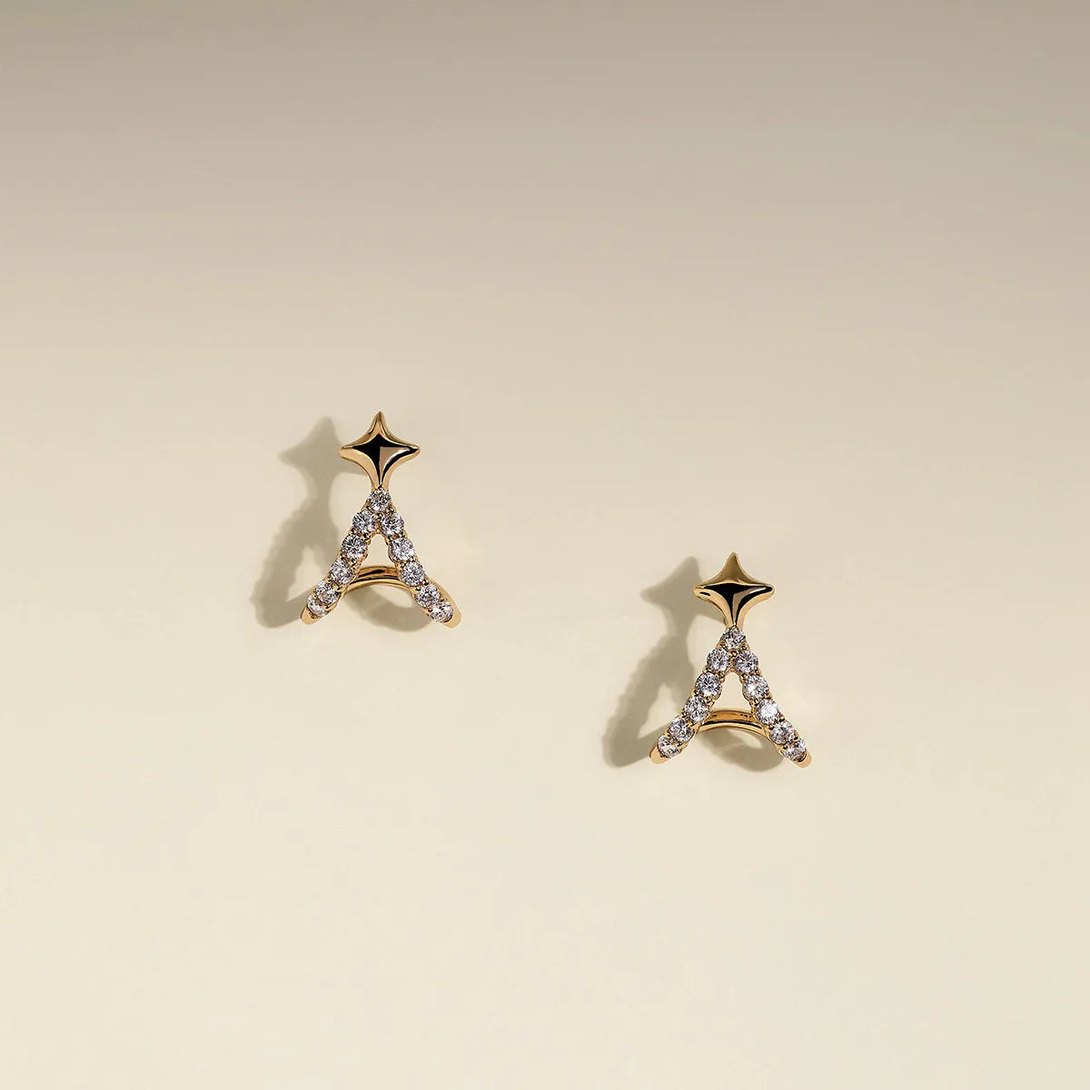 Cosmic Star Illusion Studs in Gold