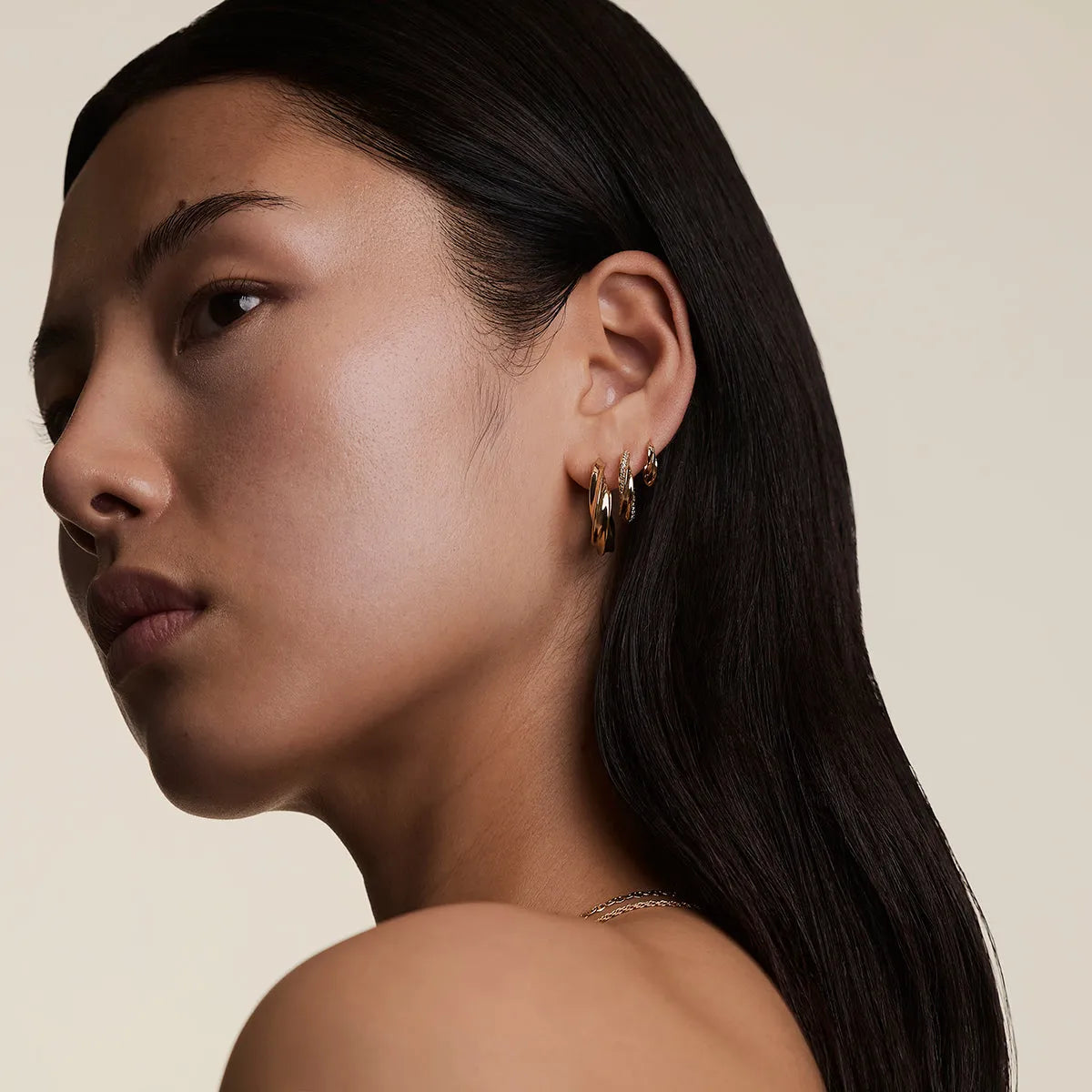Crystal Cosmic Twist Medium Hoops in Gold