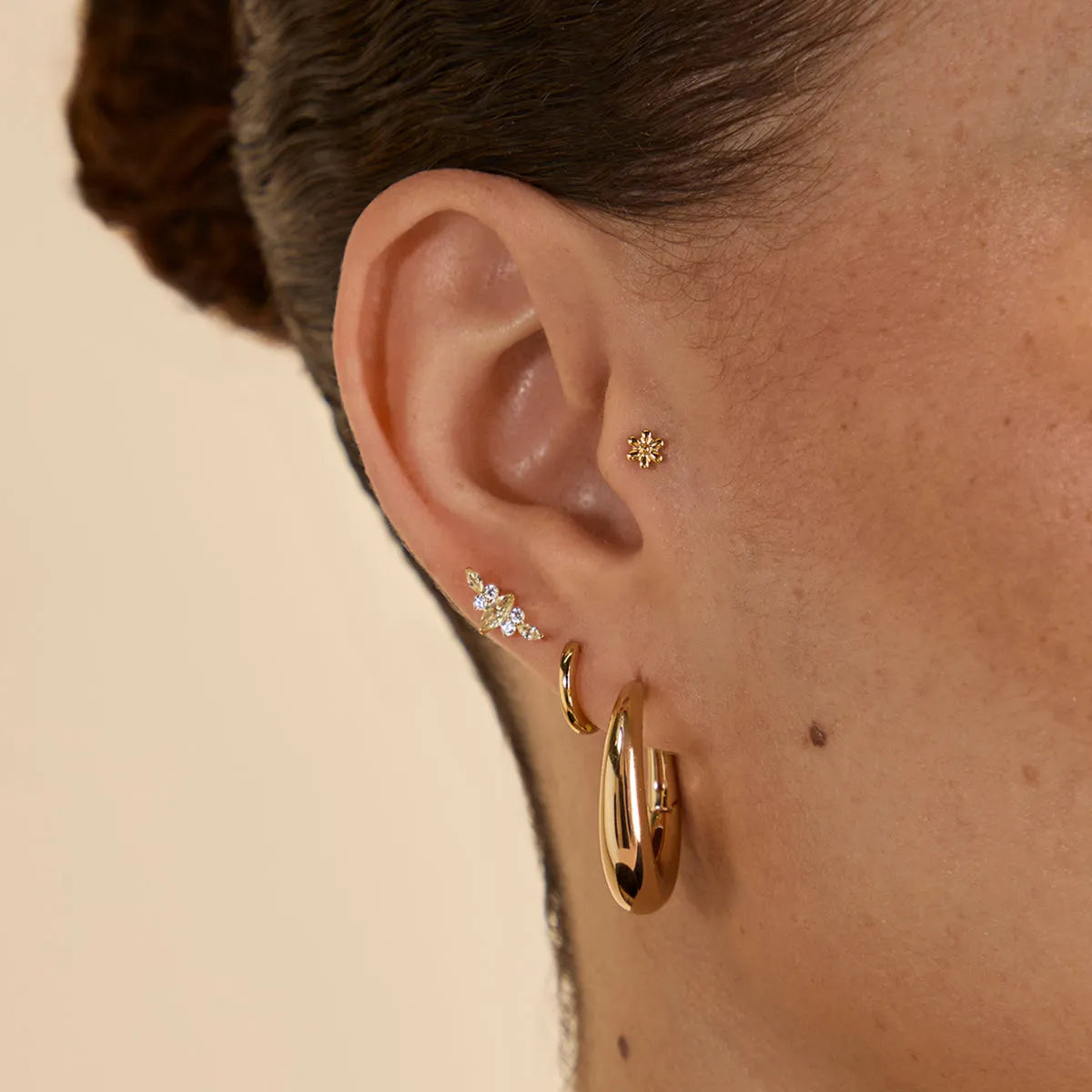 Flower Titanium Piercing Stud in Gold