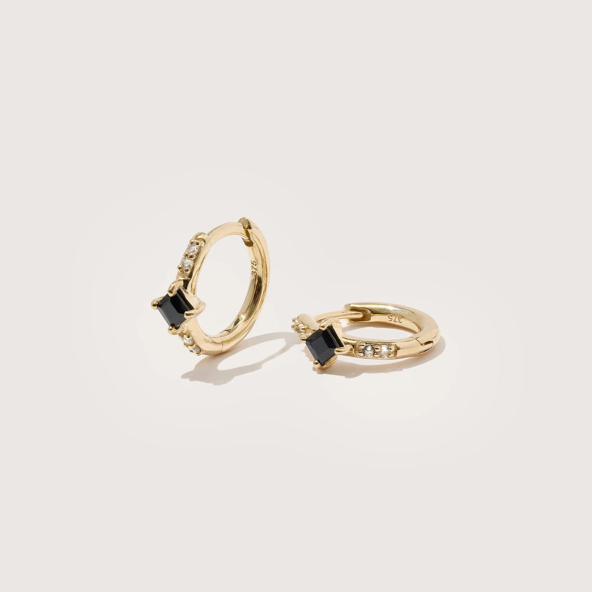 Gold Black Onyx And White Diamond Huggies
