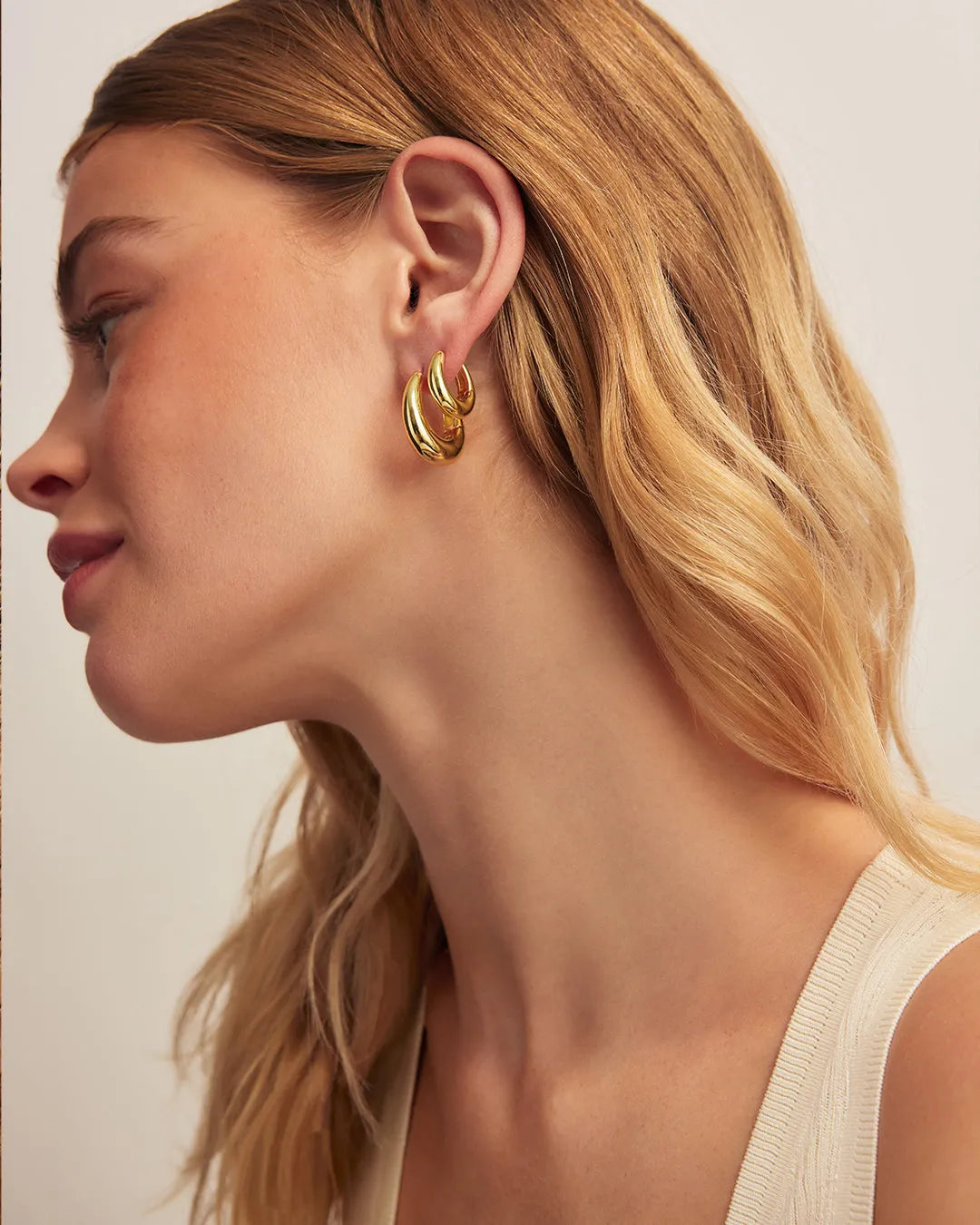 Lou Oval Huggies in 18K Gold Plated