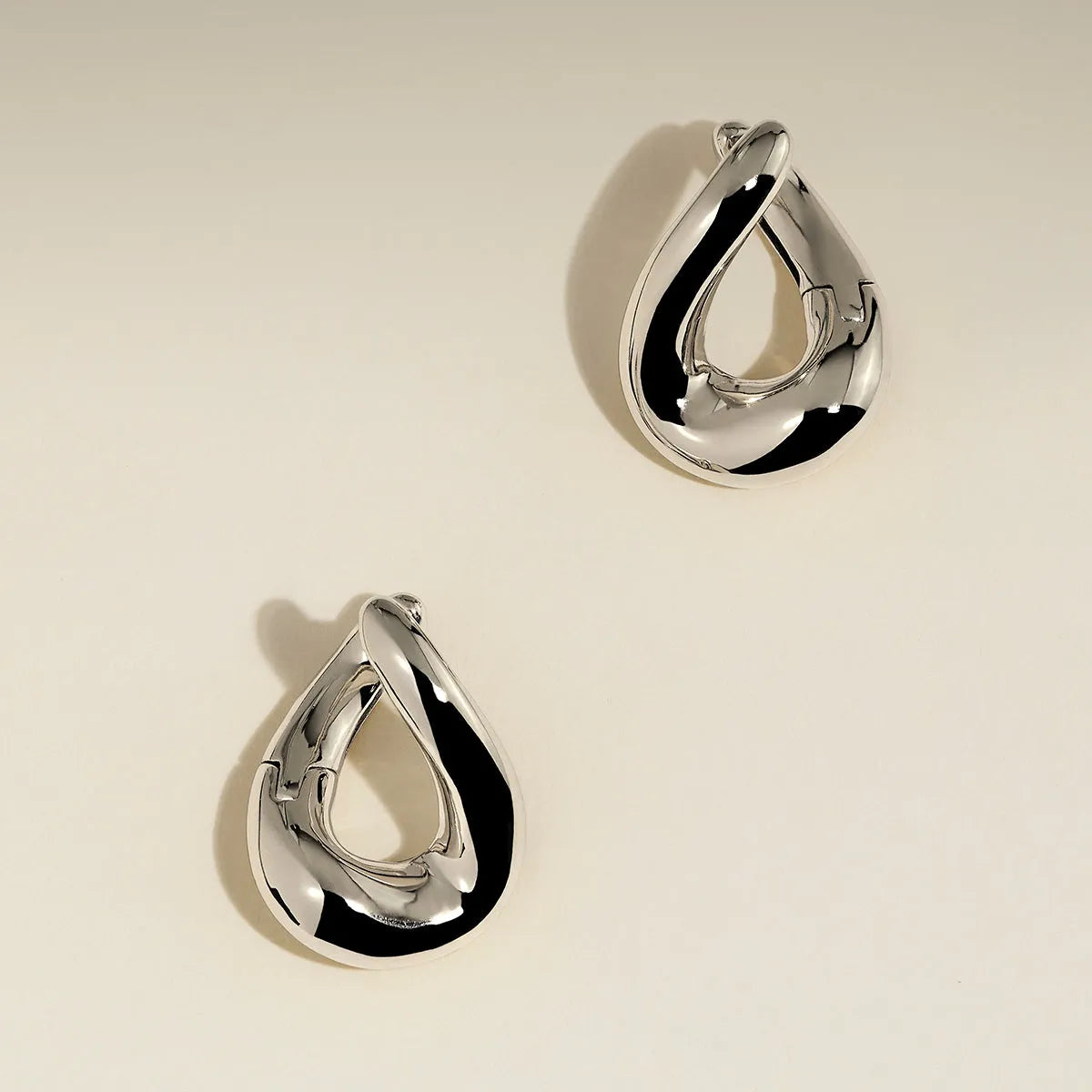 Molten Hoop Earrings in Silver