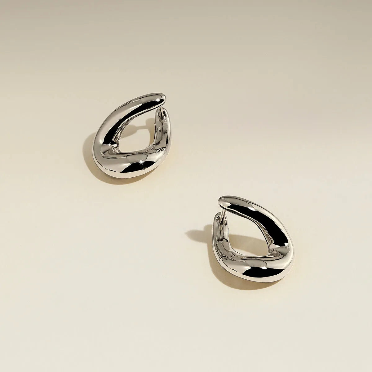 Molten Hoop Earrings in Silver