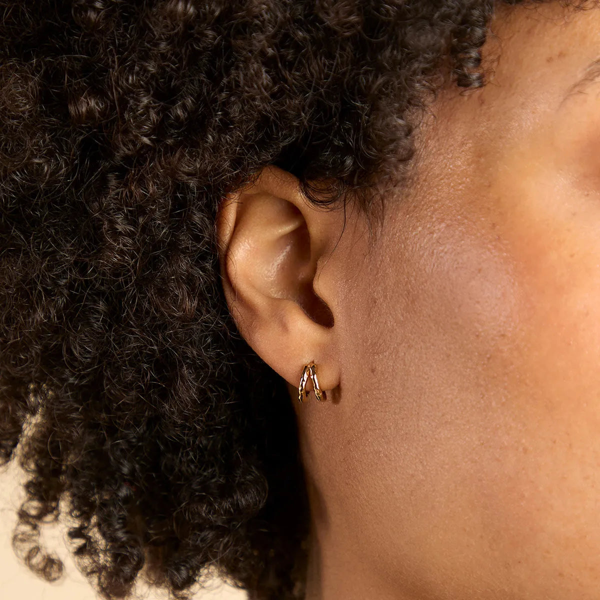Molten Textured Illusion Huggie Earrings in Gold