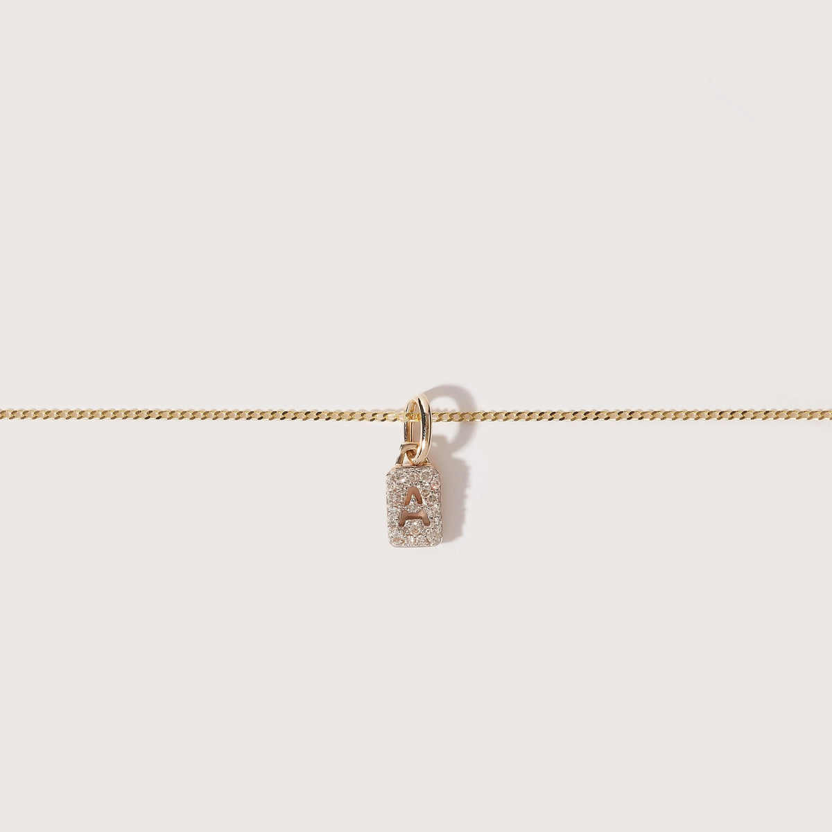 Tiny Diamond Initial Tag Pendant